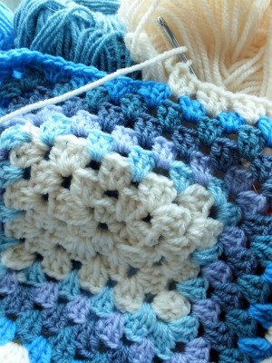 crochet granny square in blues and white