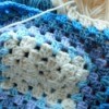 crochet granny square in blues and white