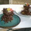 Homemade candy trees with nests and jelly bean eggs.