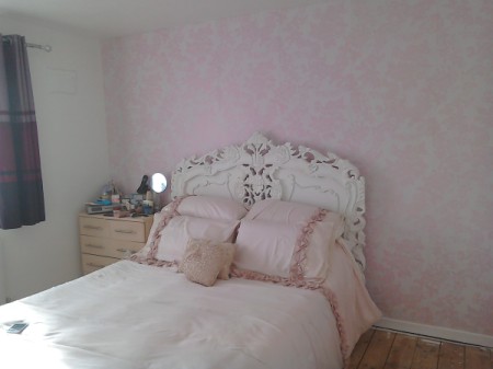 bed and wallpaper