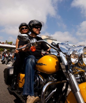man & woman on motorcycle
