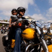 man & woman on motorcycle