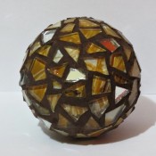 A glass ball with a funky pattern.