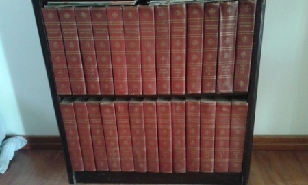 volumes on bookshelf