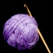 A ball of yarn and a crochet hook.