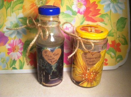 Jars of mouth rinse and tooth powder.