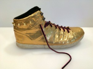 Decorating Shoes With Duct Tape - athletic shoes covered in gold duct tape