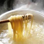 A pot of cooking pasta.