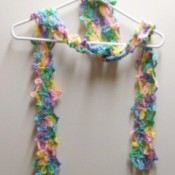 finished scarf hanging on clothes hanger