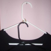 tab connecting two hangers