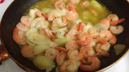 A pan of cooked shrimp