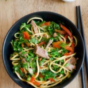 bowl of veggies, pork and noodles