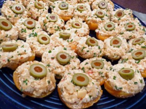 A plate of chicken gorgonzola stuffed apricot cups