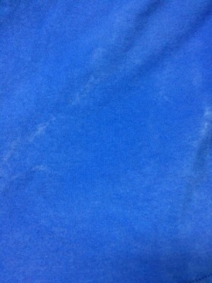 blue t-shirt with white marks