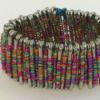 Colorful bracelet made with safety pins and beads.