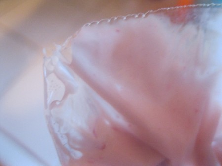 cut corner of yogurt in bag