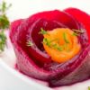 beet and carrot garnish on creamy soup