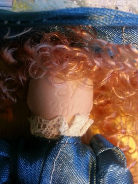 Information on Eden Porcelain Doll