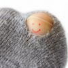 hole in sock exposing big toe nail with smiley face