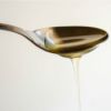 spoon with drizzling agave syrup