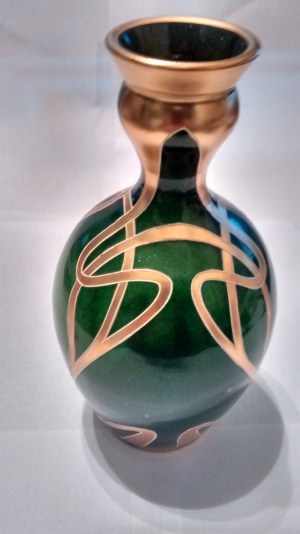 dark green glass vase with gold design