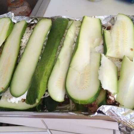 zucchini added to baking pan