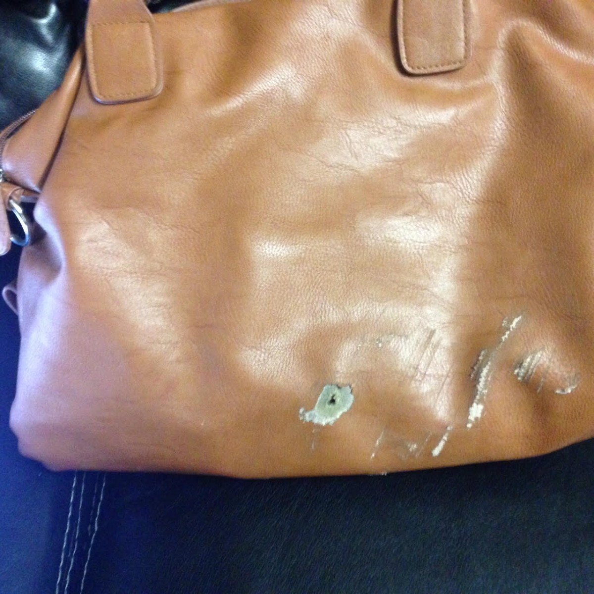 leather bag repairs near me