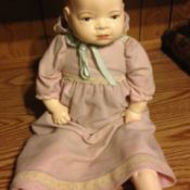 ceramic and cloth doll