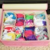A sock drawer organizer filled with socks.