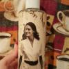 bottle of shampoo decorated with photo cutout