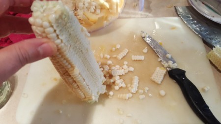 cutting corn off the cob