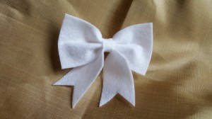 finished white felt bow