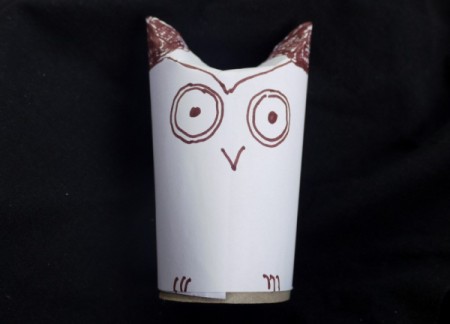 Easy Recycled Owl - Drawing a face on the owl.