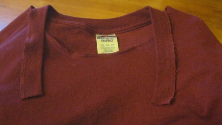 Placing the collar to be resewn.