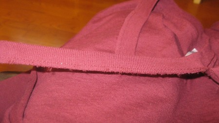 Replacing the collar on a newly altered t-shirt.