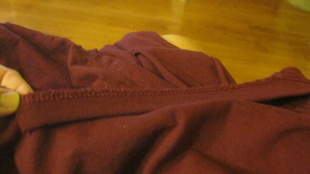 Replacing the collar on a newly altered t-shirt.