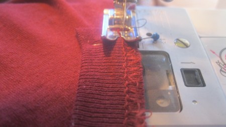 Replacing the collar on a newly altered t-shirt.