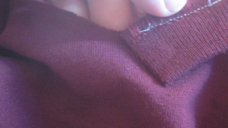 Replacing the collar on a newly altered t-shirt.