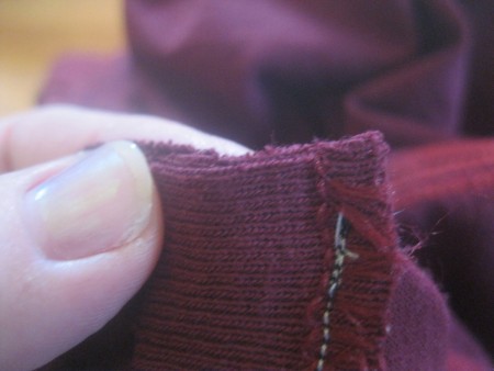 Replacing the collar on a newly altered t-shirt.