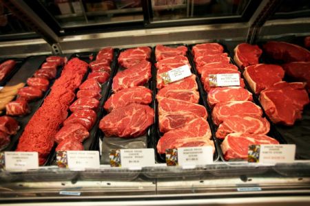 steaks in a supermarket meat case