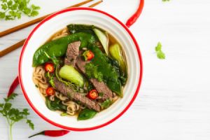 Asian style soup with strips of steak