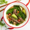 Asian style soup with strips of steak