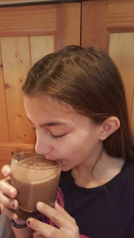 girl drinking smoothie
