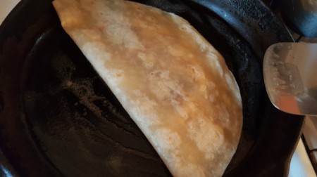 flipping quesadilla