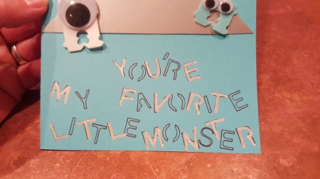 Googly eye monsters on the front of a card that says "You're my favorite little monster."