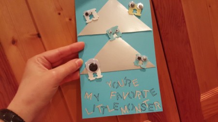 Googly eye monsters on the front of a card that says "You're my favorite little monster."