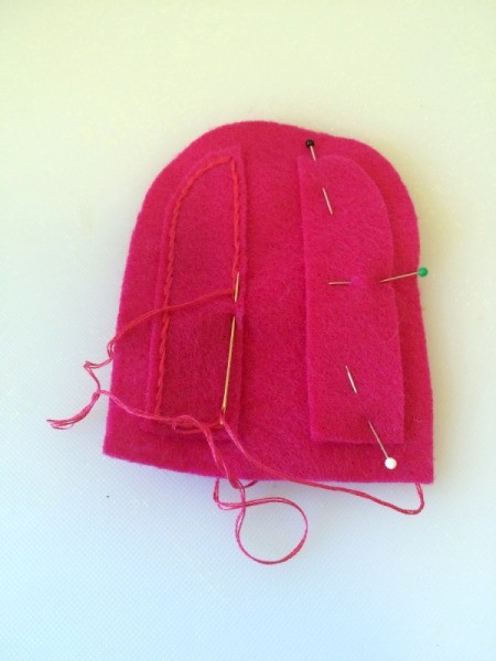 Sewing the felt pieces together.