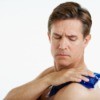 Man putting Ice Pack on his Shoulder