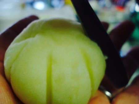 scoring lines on potato ball