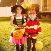 Kids trick or treating on Halloween.